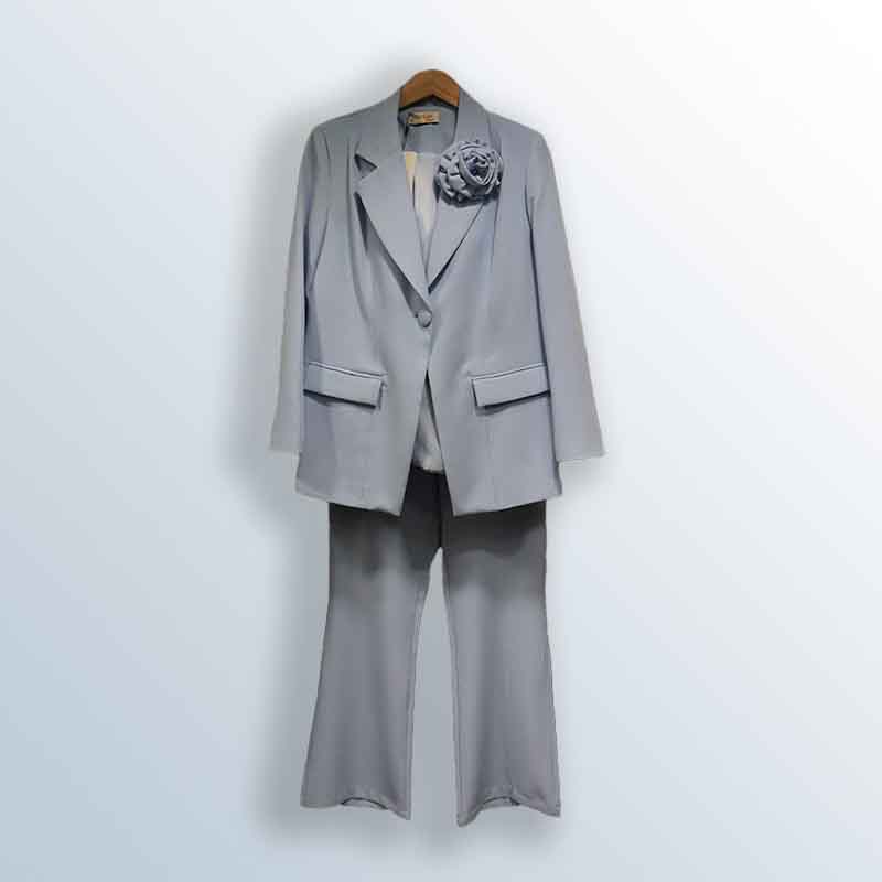 Formal crepe suit with rose brooch