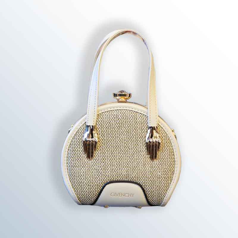 Casual Handbag with Luxurious Woven Design and Unique Details 