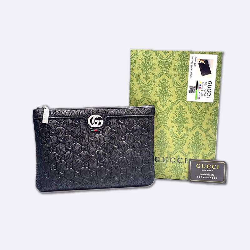 Gucci Embossed Leather Clutch